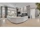 Spacious living room with floor-to-ceiling windows, comfortable seating, and stylish decor at 133 Via Capri, New Smyrna Beach, FL 32169