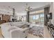 Bright, open-concept living room featuring a modern kitchen and seamless indoor-outdoor flow at 133 Via Capri, New Smyrna Beach, FL 32169