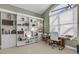 This office offers custom shelving, a spacious desk area, and a chair, perfect for a productive workspace at 133 Via Capri, New Smyrna Beach, FL 32169
