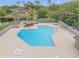 Aerial view of community pool and jacuzzi with plenty of lounge chairs and seating at 160 Reserve Cir # 204, Oviedo, FL 32765