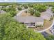Overhead perspective of lush trees surrounding the building, offering a serene and private living environment at 160 Reserve Cir # 204, Oviedo, FL 32765