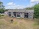 Aerial view of multi-Gathering property highlighting screened lanais and well-maintained exteriors, offering inviting outdoor spaces at 160 Reserve Cir # 204, Oviedo, FL 32765
