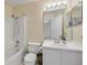 Bright bathroom with white cabinets, a modern sink, and a shower-tub combo offers a clean and functional space at 160 Reserve Cir # 204, Oviedo, FL 32765