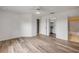Large bedroom with wood floors, a ceiling fan, and multiple access points to other areas at 160 Reserve Cir # 204, Oviedo, FL 32765
