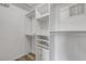 Spacious walk-in closet with built-in shelves, drawers, and ample storage space at 160 Reserve Cir # 204, Oviedo, FL 32765