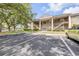 Two-story multi-Gathering building with reserved parking and landscaping, showcasing the property's well-maintained exterior at 160 Reserve Cir # 204, Oviedo, FL 32765