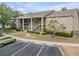 Multi-Gathering building with a two-story layout, reserved parking, and neat landscaping, offering a welcoming exterior at 160 Reserve Cir # 204, Oviedo, FL 32765