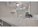Kitchen pass-through and stainless steel appliances at 160 Reserve Cir # 204, Oviedo, FL 32765
