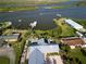 This waterfront home offers stunning water views, a private dock and sparkling pool at 1601 S Riverside Dr, Edgewater, FL 32132