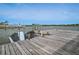 This dock offers water access with ladder and views out to a distant lighthouse at 1601 S Riverside Dr, Edgewater, FL 32132