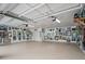 Large, well-lit garage featuring painted floors, ample storage, and lots of room for parking at 1601 S Riverside Dr, Edgewater, FL 32132