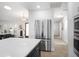 Bright kitchen featuring stainless steel appliances and white countertops, offering a modern and clean aesthetic at 1601 S Riverside Dr, Edgewater, FL 32132