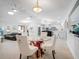 Spacious living and dining area with ample seating, modern kitchen, and open floor plan concept at 1601 S Riverside Dr, Edgewater, FL 32132