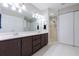 Large bathroom with a double sink vanity, sleek lighting, and a glass-enclosed shower stall at 1688 Town Park Dr, Port Orange, FL 32129