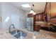 Modern kitchen features stainless steel appliances, granite countertops, and ample storage space at 1688 Town Park Dr, Port Orange, FL 32129