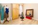 Versatile bedroom with storage cabinet, natural light, and flexible workout area at 1748 Savannah Ln, Port Orange, FL 32128