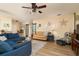 Inviting living room with cozy seating, modern lighting, and stylish decor at 1748 Savannah Ln, Port Orange, FL 32128