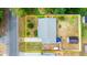 Aerial view of house and lot with potential boundary lines at 1851 Needle Palm Dr, Edgewater, FL 32141