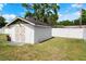 The backyard of this property features a detached shed, offering outdoor storage solutions for tools and equipment at 1851 Needle Palm Dr, Edgewater, FL 32141