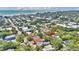 Aerial view of home in coastal town near beach at 209 Esther St, New Smyrna Beach, FL 32169