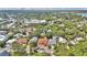 Neighborhood aerial view showing home locations and local surroundings with trees at 209 Esther St, New Smyrna Beach, FL 32169