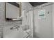 Modern bathroom featuring subway tile, updated fixtures, and a walk-in shower at 209 Esther St, New Smyrna Beach, FL 32169