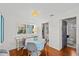 Cozy dining nook with wooden floors and lots of natural light at 209 Esther St, New Smyrna Beach, FL 32169