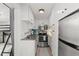 Efficient kitchen space featuring stainless steel appliances and modern white cabinetry at 209 Esther St, New Smyrna Beach, FL 32169