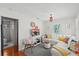 Inviting living room featuring a comfortable sofa and lots of natural light at 209 Esther St, New Smyrna Beach, FL 32169