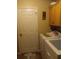Practical laundry room with washer, dryer, and overhead storage cabinet at 227 Two Oaks Dr, Edgewater, FL 32141