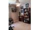 Well-organized home office with bookshelves and decor accents at 227 Two Oaks Dr, Edgewater, FL 32141