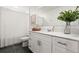 Bathroom featuring a vanity with sleek white cabinetry and modern fixtures at 2516 Hoptree Ln, Edgewater, FL 32141