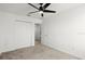 Bedroom featuring carpet, large closet and a ceiling fan at 2516 Hoptree Ln, Edgewater, FL 32141