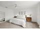 Inviting bedroom with neutral paint, and a comfy bed, creates serene and relaxing ambiance at 2516 Hoptree Ln, Edgewater, FL 32141