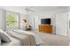 Spacious bedroom features neutral paint and a large window, creating comfortable living space at 2516 Hoptree Ln, Edgewater, FL 32141