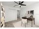 Bright office with modern desk, chair, and built-in bookcase at 2516 Hoptree Ln, Edgewater, FL 32141