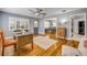 Stylish home office with hardwood floors, plantation shutters, and a comfortable workspace at 2548 E Compton St, Orlando, FL 32806