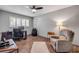 Functional office with a desk, rolling chair and a comfortable armchair at 2548 E Compton St, Orlando, FL 32806