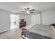 Serene bedroom adjacent to the dining area, designed with a minimalist approach and ample space at 2713 Needle Palm Dr, Edgewater, FL 32141