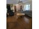 Inviting living room with hardwood floors, comfortable seating, and lots of natural light creating a warm ambiance at 2725 Travelers Palm Dr, Edgewater, FL 32141