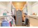 Walk-in closet with custom shelving, a hanging rod, and a safe for valuables at 2913 Linari Ct, New Smyrna Beach, FL 32168
