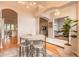 Cozy dining area with modern light fixture and view to living area at 2913 Linari Ct, New Smyrna Beach, FL 32168