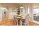 Charming dining room with modern light fixtures and access to an outdoor seating area at 2913 Linari Ct, New Smyrna Beach, FL 32168