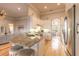 Spacious open floorplan with kitchen island featuring granite counters and stainless appliances at 2913 Linari Ct, New Smyrna Beach, FL 32168