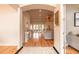 Open-concept living space with hardwood floors and serene decor at 2913 Linari Ct, New Smyrna Beach, FL 32168
