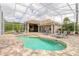 Beautiful screened-in pool, patio, and outdoor kitchen create a perfect space for entertaining and relaxation at 2913 Linari Ct, New Smyrna Beach, FL 32168