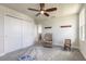 Bedroom with a ceiling fan, carpeted floor, and closet at 3136 Portofino Blvd, New Smyrna Beach, FL 32168