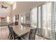Bright dining room with high ceilings, a large table and chairs, and lots of natural light at 3136 Portofino Blvd, New Smyrna Beach, FL 32168