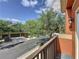 Exterior community view with multiple homes, garages, and landscaping, viewed from a balcony at 3311 Pine Oak Trl, Sanford, FL 32773