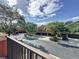 Community exterior view with multiple homes, garages, landscaping, and beautiful blue sky at 3311 Pine Oak Trl, Sanford, FL 32773
